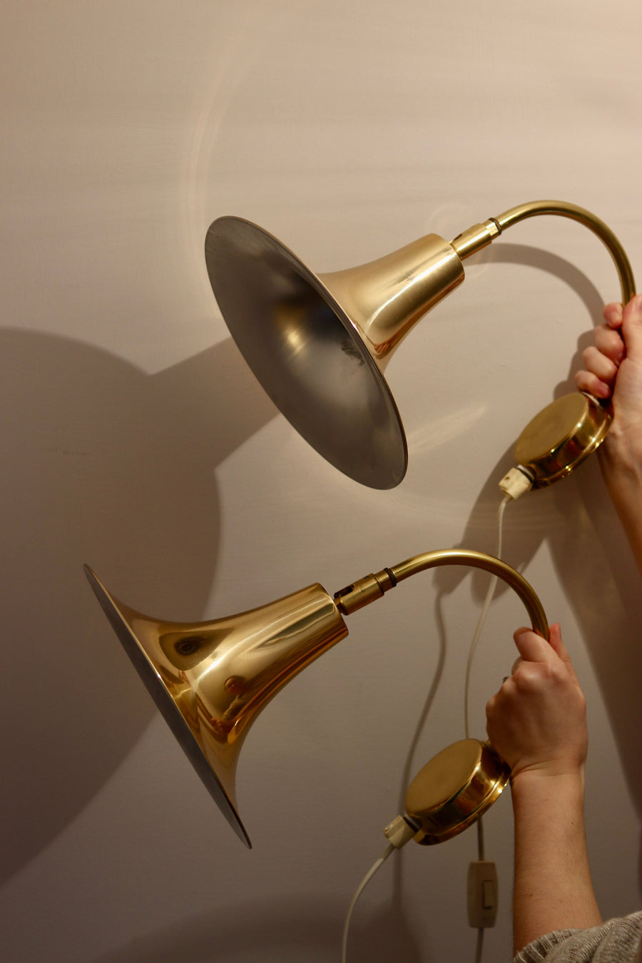 1960's Pair of Statement Trump Shape Lights in Brass, designed by Börje Claes for Norlett Elit. Noah Ancienne